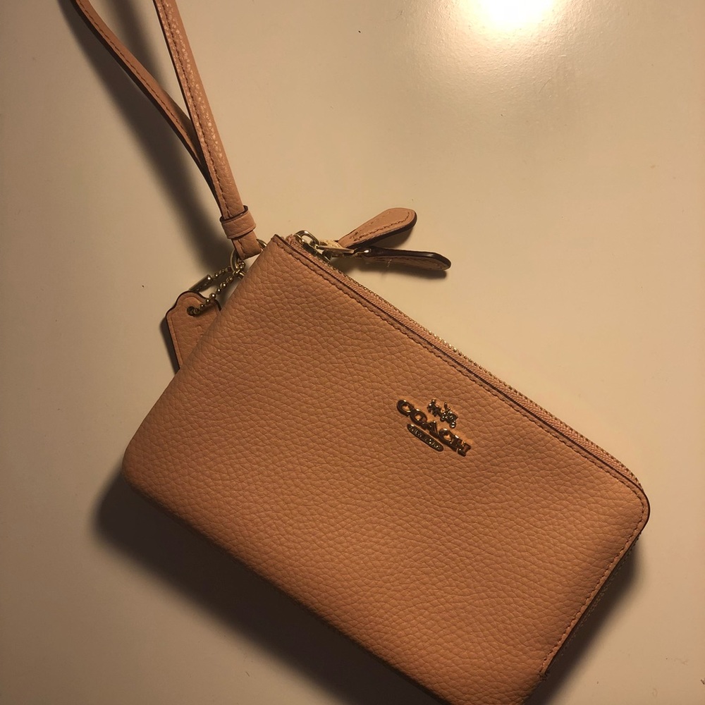 Nude pink Coach wristlet wallet